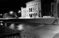 The National Library and Miljacka by night