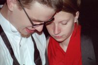 Julius and Maria look through his photos