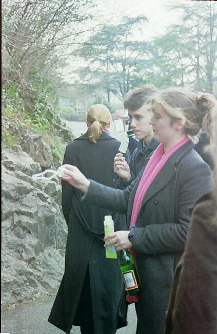 Kate blows bubbles